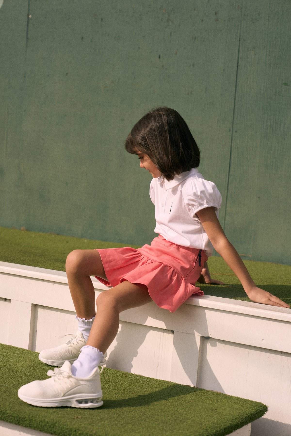 Louise and the Puff-Sleeved Polo in White